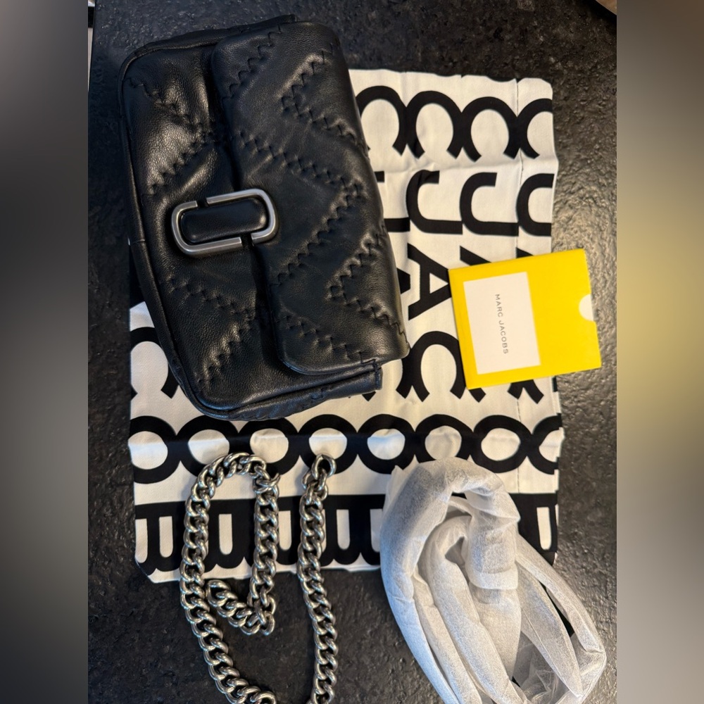 THE QUILTED
LEATHER J MARC MINI SHOULDER BAG